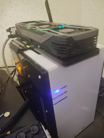 A lower-angled photo of the janky PC case.